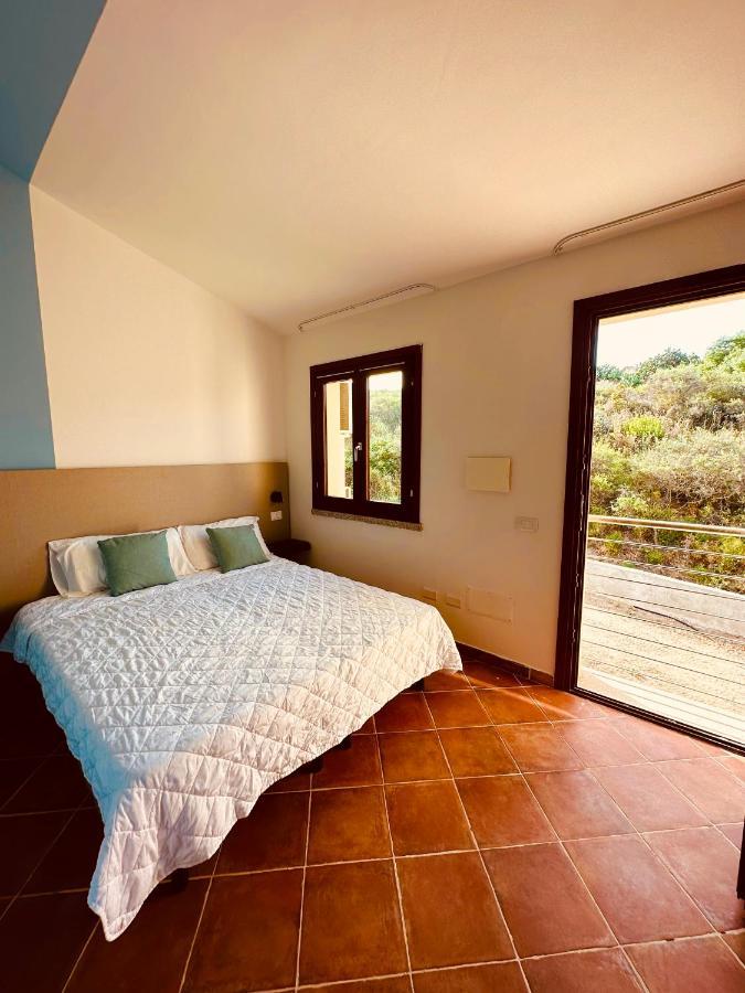 Rocce Rosse Sardinia Aparthotel Isola Rossa Esterno foto